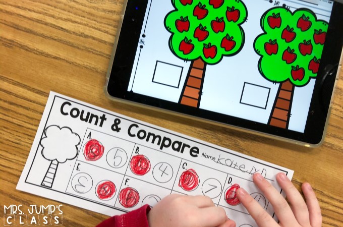 An apple tree themed digital center for comparing numbers